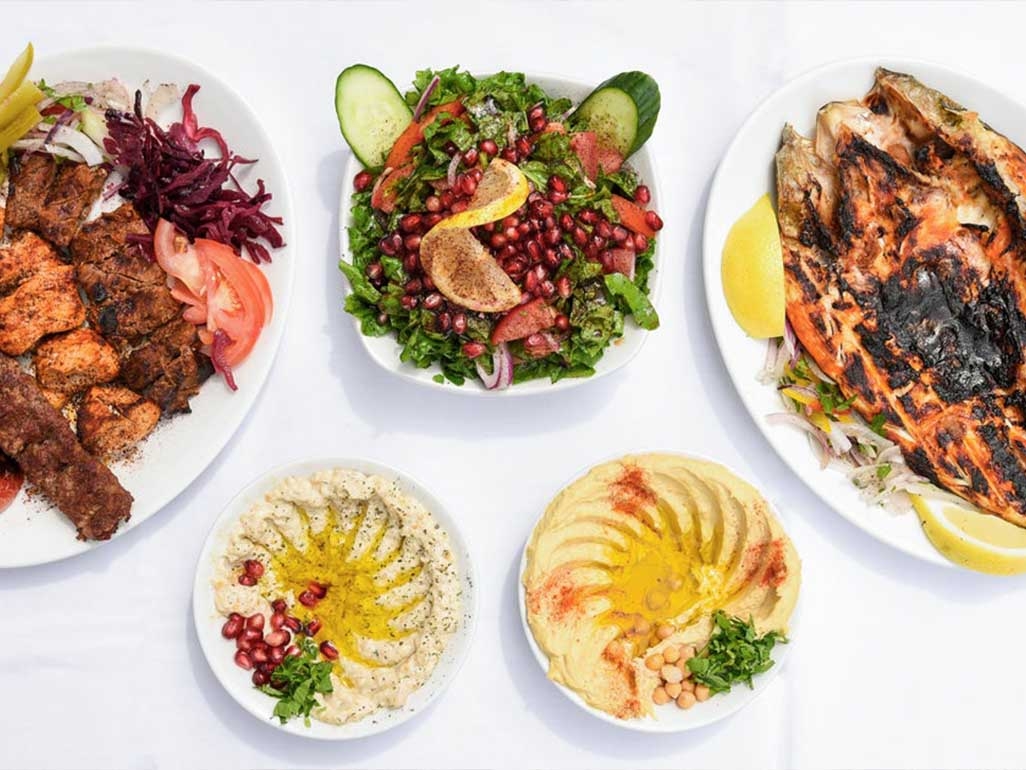 Turkish dishes including hummus and rainbow salad