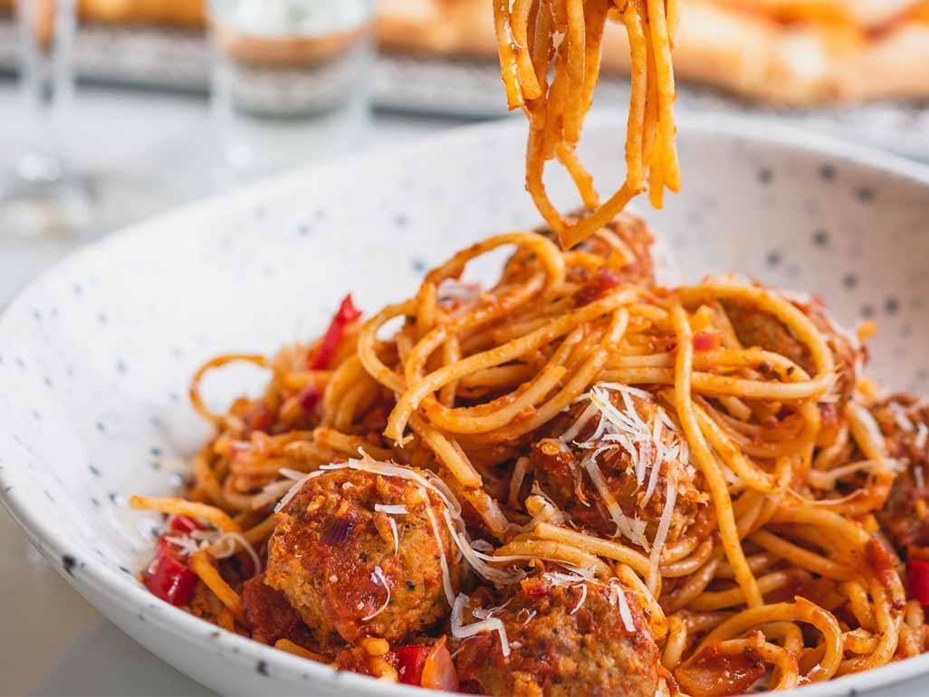 Meatballs and spaghetti with parmesan cheese